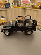 Dark Blue Jeep Wrangler Rubicon Convertible - Image 2