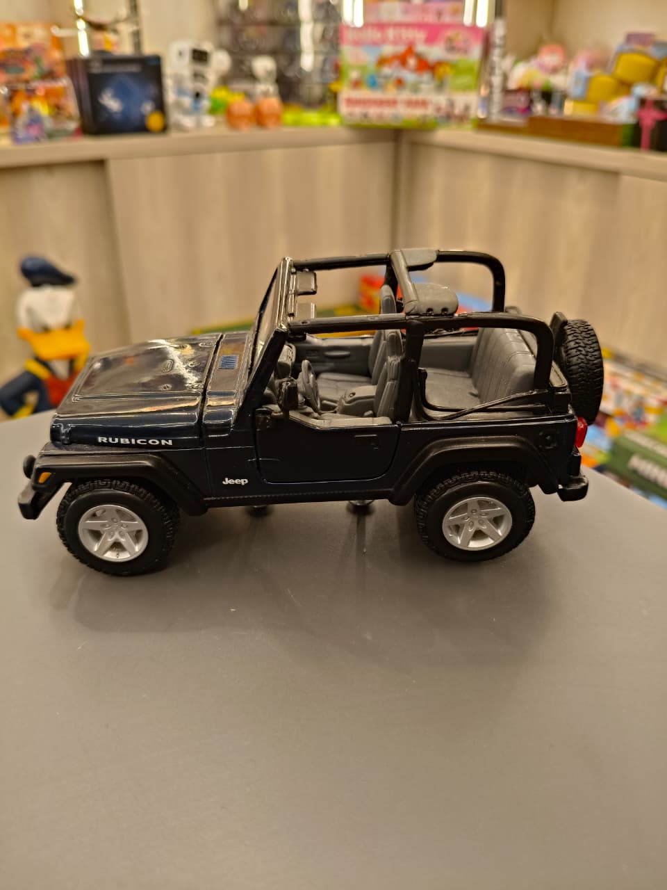 Dark Blue Jeep Wrangler Rubicon Convertible - Image 2